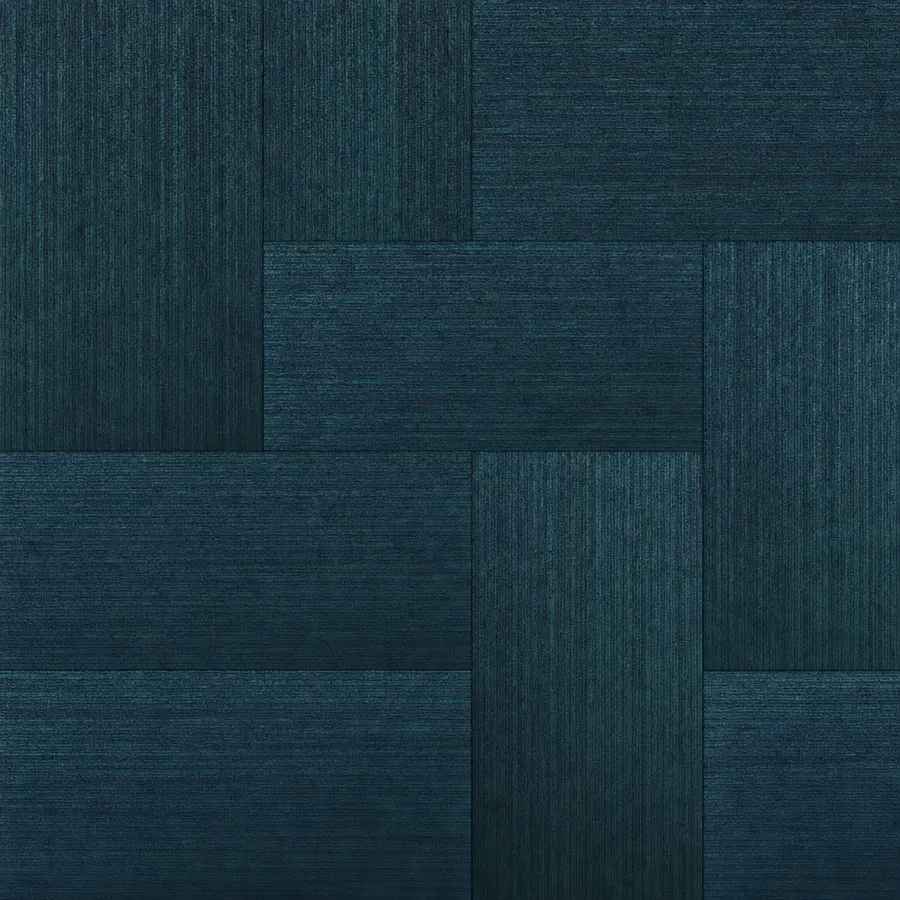 Petrol-teal blue commercial carpet tiles with a bold directional plank pattern