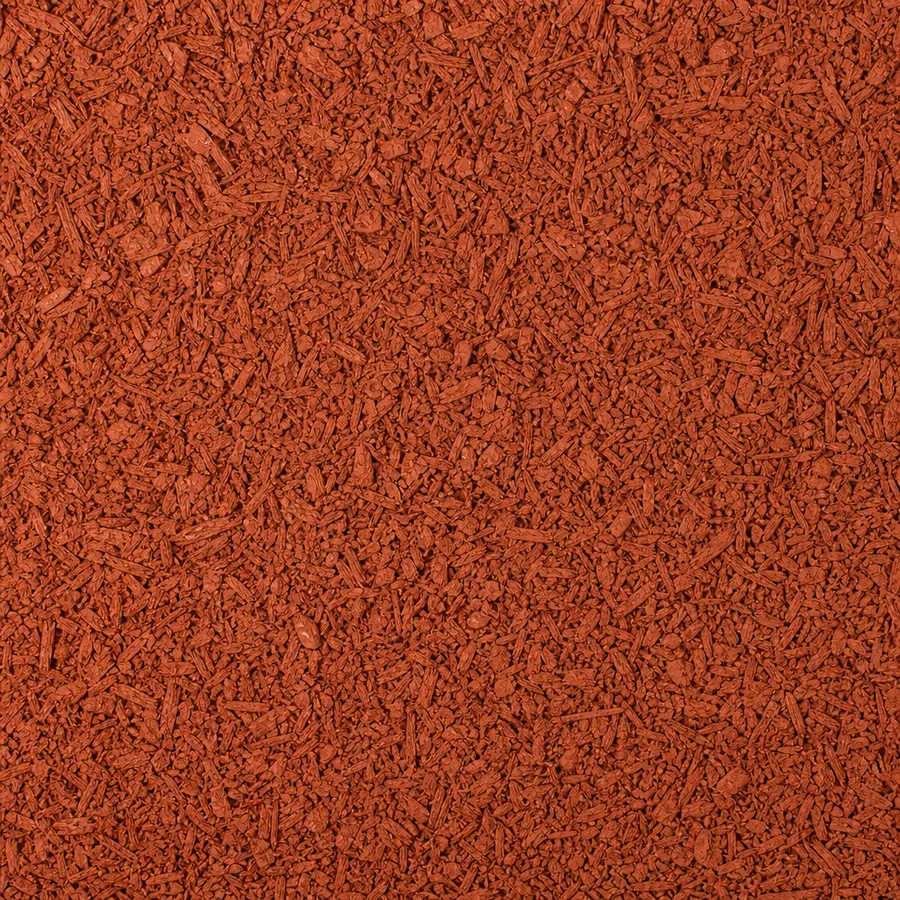 Terracotta-red bonded rubber mulch playground surfacing with a bark-like texture