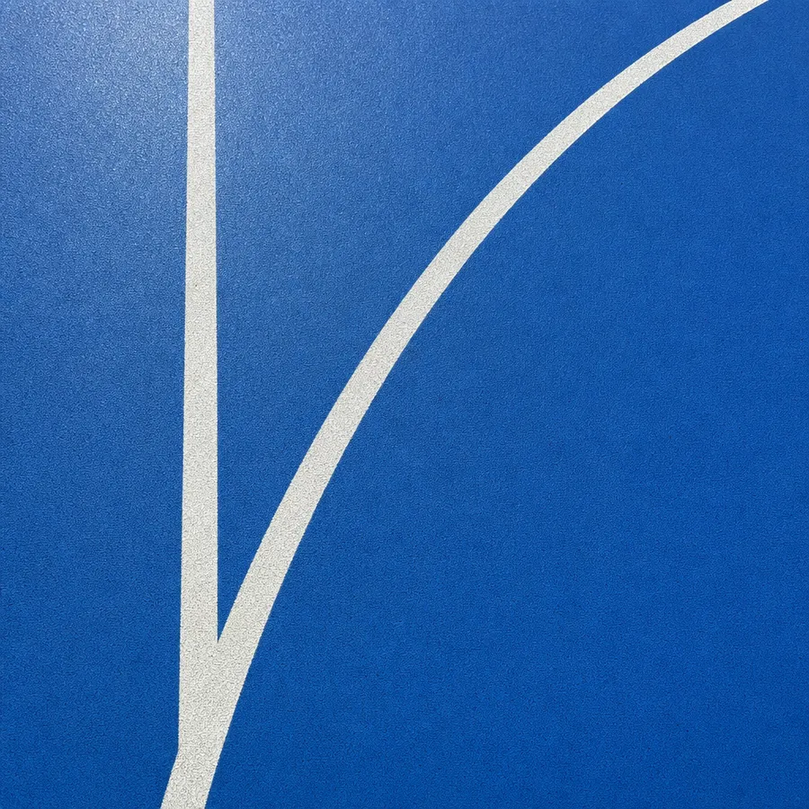 Royal-blue seamless polyurethane indoor sports floor with white court lines